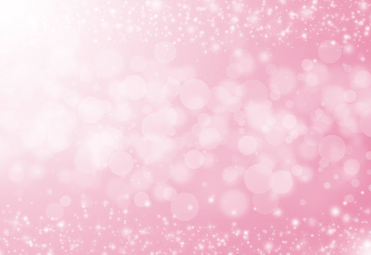 Soft Pink glitter sparkles rays lights bokeh festive elegant abstract background.