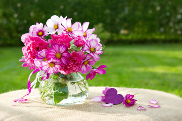 Bouquet colorful cosmos flowers and heart . Holiday card.