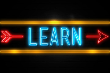 Learn  - fluorescent Neon Sign on brickwall Front view