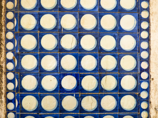 Old blue portuguese tiles (azulejos) with circle pattern in Lisbon