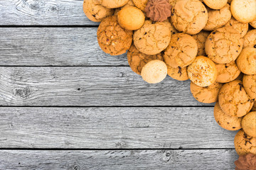 Cookies and biscuits at gray wood with copy space
