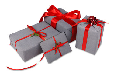 Christmas gift boxes in gray paper isolated on white