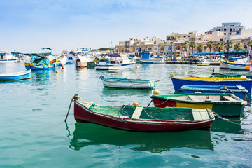 Fototapeta premium Traditional boats at Marsaxlokk Harbor in Malta