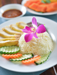Obraz na płótnie Canvas Hainanese chicken rice , Thai gourmet steamed chicken with rice