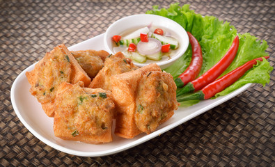 Fried bread with minced pork spread. Thai food