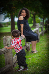 child and mother outside
