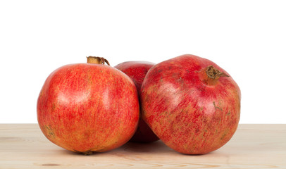 Fresh ripe pomegranate isolated on white background