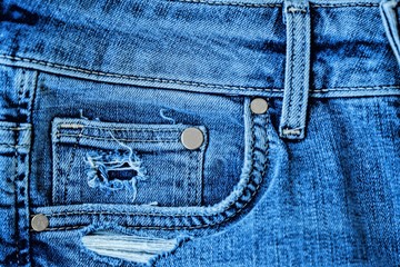 Blue denim jeans with pocket and label 