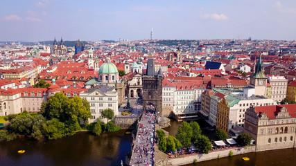 Fototapeta na wymiar Prague, Czech Republic - Beautiful summer’s day over the city, including Charles Bridge and Prague one municipal district 