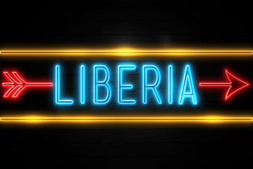 Obraz premium Liberia - fluorescent Neon Sign on brickwall Front view