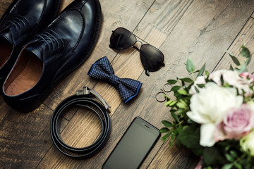bow tie,shoes,belt, wedding rings ,telephone,clock,glasses,bride's bouquet,the groom...