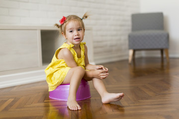 Little girl on the potty