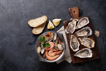 Photo sur Plexiglas Crustacés Fruits de mer frais sur table en pierre