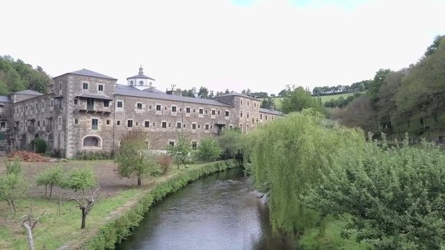 fly over the Sarria river and onto the 6th century Monastery of Saint Julian of Samos