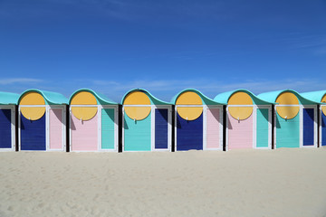 Beach huts on Dunkirk beach, France - obrazy, fototapety, plakaty