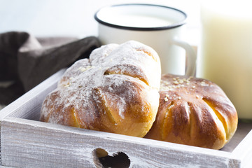 Milk bun dessert breakfast  wooden background
