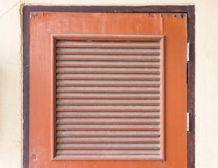 Old wooden door with louver.