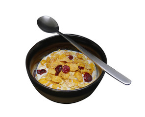 Crispy and healthy organic breakfast cereal flakes with red dried cranberry and cold soy milk in dark black handmade pottery bowl. Spoon on bowl. Isolated on white background with clipping path.