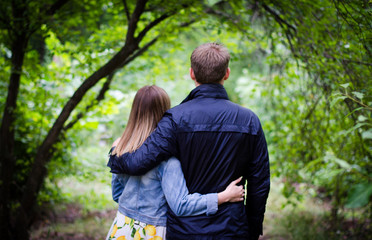 A couple in love, walking in the Park
