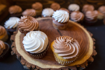 Cupcakes on wooden plate