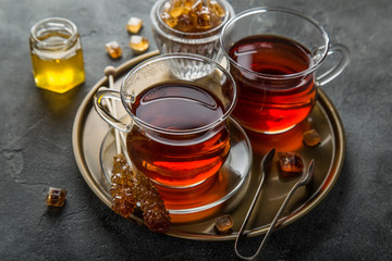 tea in glass cup with caramelized sugar