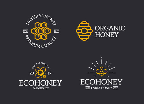 Set of retro vintage honey and bee, honeycomb, hive logo or insignia, emblems, labels and badges and other branding objects. Vector line style