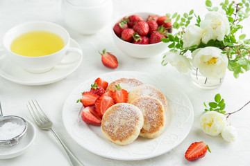 cottage cheese pancakes with fresh strawberry for breakfast
