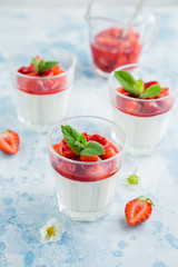 vanilla cream cheese and strawberry dessert on glasses