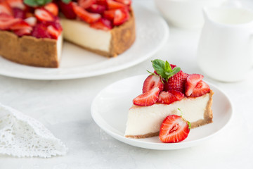 slice of strawberry cheesecake on white background - 170472945