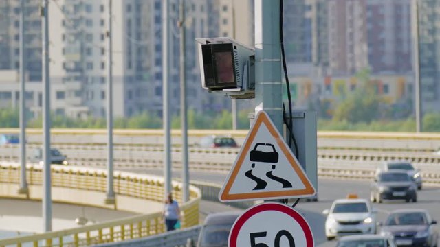 Radar speed control camera and signs on the road