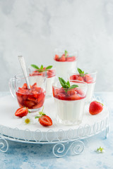 delicious dessert with  cream cheese and strawberry sauce