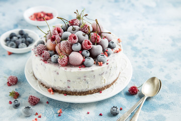 delicious ice cream cake with frozen berries
