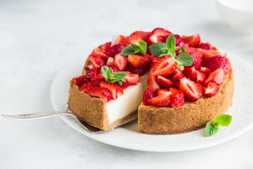 cheesecake  with fresh strawberry on white background