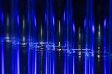 Abstract: Vertical Streaks of Blue and White Light Forming a Fascinating Background