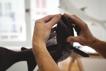 Craftsman working on fish sculpture