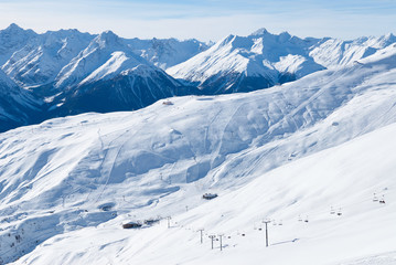 Fototapeta na wymiar Winter landscape view. Small mountain ski resort Scuol in Switzerland.