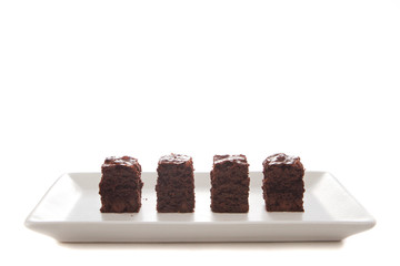 Homemade chocolate brownies served on a plate