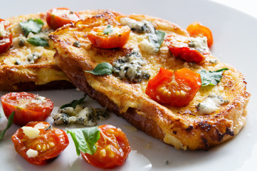 french toast with roasted tomatoes and cheese