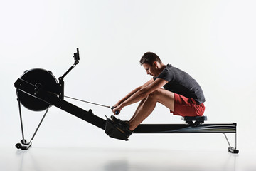 Man Using A Press Machine In A Fitness Club.