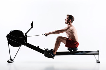 Man Using A Press Machine In A Fitness Club.