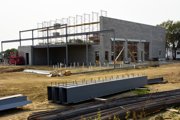 Fototapeta premium Commercial concrete block building under construction.