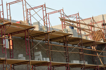 Commercial concrete block building under construction.