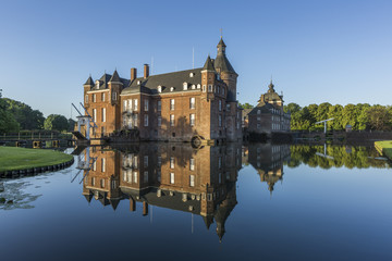 Fototapeta na wymiar Beautiful reflection of Anholt castle in Isselburg, Germany