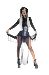 Beautiful woman in a black corset and heels