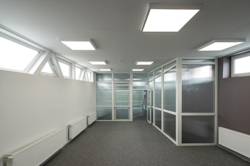 Office interior with glass walls.
