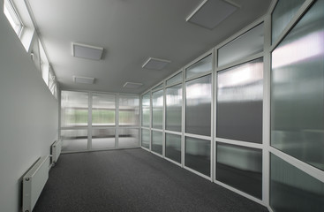 Office interior with glass walls.