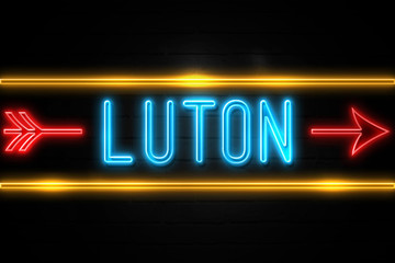 Luton  - fluorescent Neon Sign on brickwall Front view