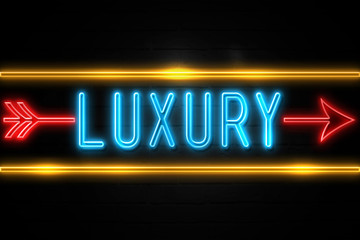 Obraz premium Luxury - fluorescent Neon Sign on brickwall Front view