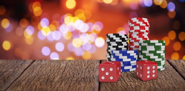 Composite image of red dice with stack of colorful casino tokens