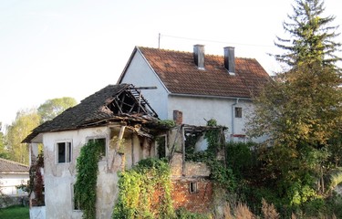 Fototapeta na wymiar Bosnia Herzegovina - October 30 2012. A damaged house in Bosnia Herzegovina